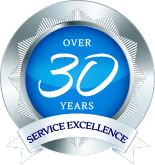 RealtorAssociationLogo A silver and blue badge that reads: Over 30 Years of Service Excellence
